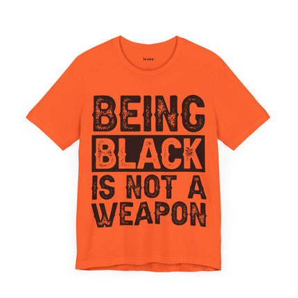 Being Black Not  A Weapon - Unisex Jersey Short Sleeve Tee